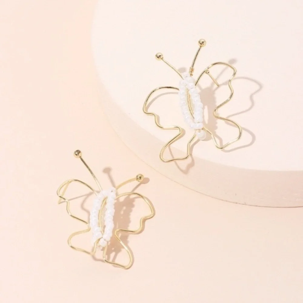 3/$30 💛 Beaded Abstract Butterfly Earrings